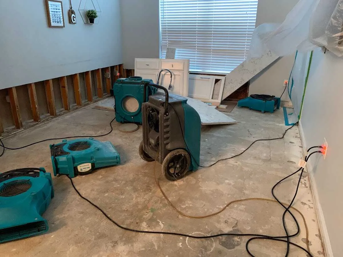 Dehumidifier in flood-cut room for Water Damage Restoration in Pontiac